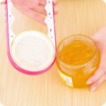 4 in 1 Multifunktions-Flaschenöffner Home Safe Offene Dosen Rutschfeste Kappe Küchenwerkzeug, zufällige Farbabgabe – Bild 3