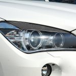 2 Stück / Set Carbon Fiber Auto Lampe Augenbraue Dekorative Aufkleber für BMW X1 / E84 2009-2014, Tropfenkleberversion – Bild 5