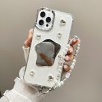 Cremefarbene TPU-Telefonhülle mit verspiegeltem Armband und Kette, For iPhone 16 Pro Max, For iPhone 16 Pro, For iPhone 16 Plus, For iPhone 16, For iPhone 15 Pro Max, For iPhone 15 Pro, For iPhone 15 Plus, For iPhone 15, For iPhone 14 Plus, For iPhone ...