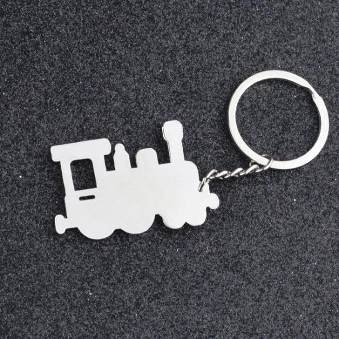 Schlüsselanhänger mit Lokomotive aus Metall – Bild 3