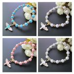 Goldgeprägtes Acryl-Engel-Kreuz-Perlenarmband – Bild 2