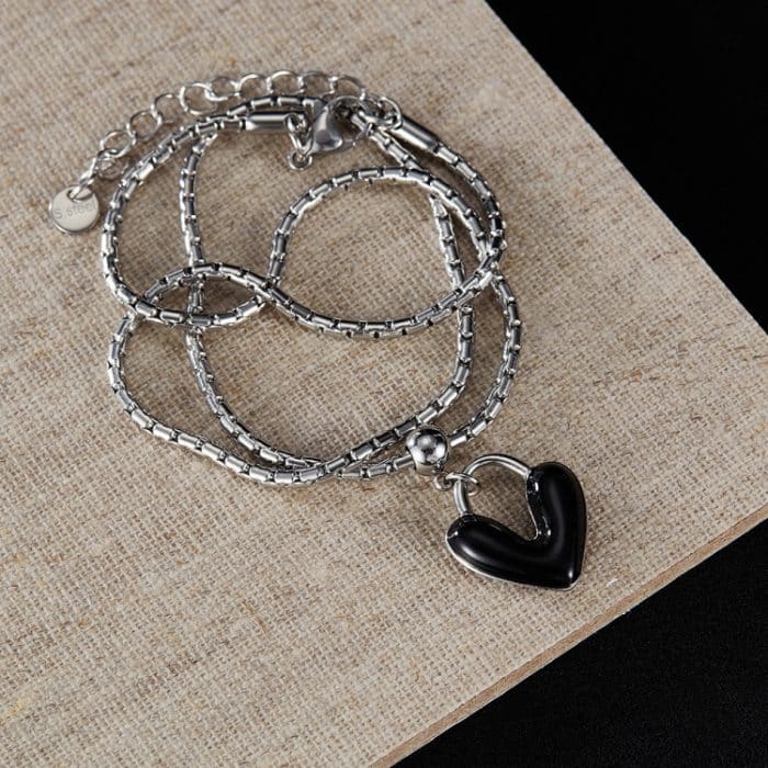 Halskette mit Anhänger aus Edelstahl mit Öltropfen-Liebeslegierung – Bild 2