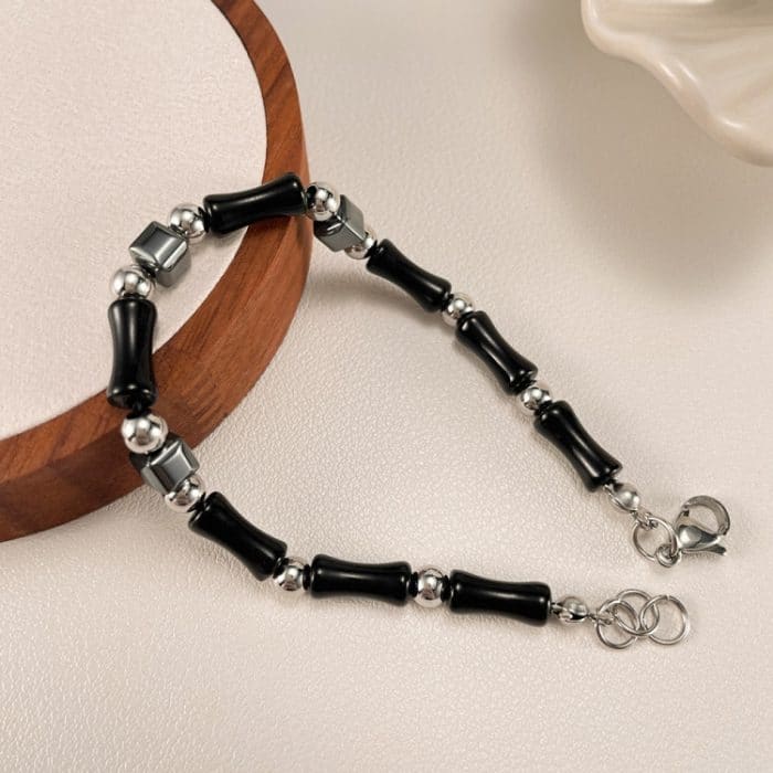 Schlichtes Patchwork-Armband aus Bambus im Tintenstil aus Edelstahl – Bild 3