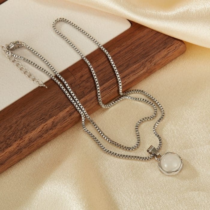 Runder Kupferanhänger mit Edelstahlkette – Bild 2