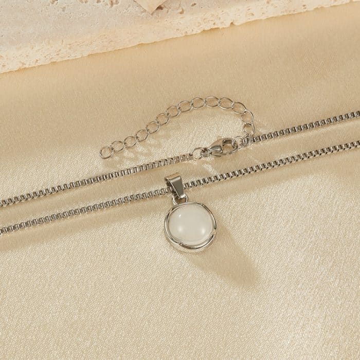 Runder Kupferanhänger mit Edelstahlkette – Bild 3