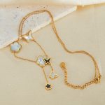 OPK GX2439 Edelstahl Schmetterling Blume Quaste Anhänger Knochen Kette – Bild 2