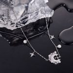 Elegante Perlenkette aus Kupfer mit Stern und Mond – Bild 3