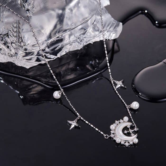 Elegante Perlenkette aus Kupfer mit Stern und Mond – Bild 3