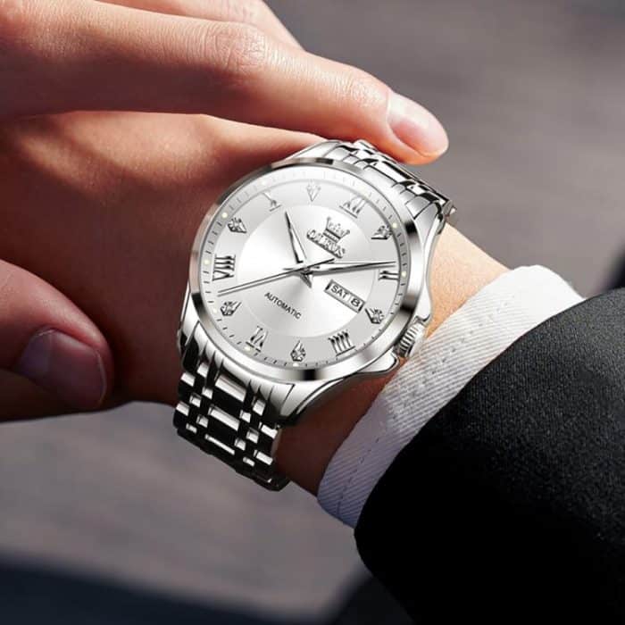 EDA007539601A_4.jpg OLEVS 6702 Herren wasserdichte, leuchtende mechanische Uhr mit Doppelkalender – Bild 5