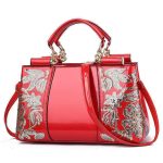 Einseitig bestickte Damenhandtasche aus glänzendem Leder, Red, Blue, Black, Rice-white, Red Wine