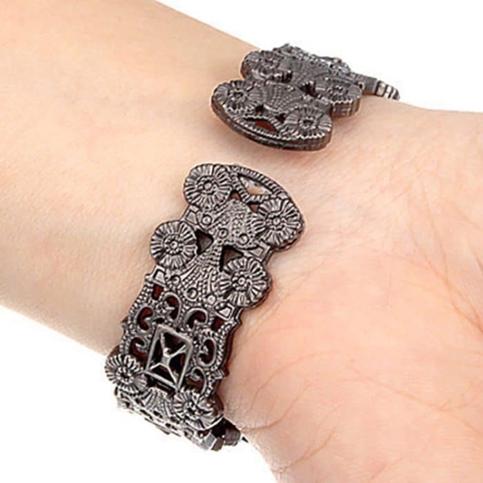 Retro-Armbanduhr mit geprägtem Blumenarmband für Damen – Bild 3